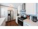 Bright kitchen with white cabinets, stainless steel appliances, and modern countertops at 9043 108Th Ave, Seminole, FL 33777
