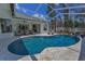 Spacious screened-in pool and patio area for enjoying the outdoors in comfort and style at 9208 Brindlewood Dr, Odessa, FL 33556