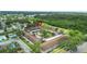 Aerial view of the condo complex, landscaping, and pool at 9821 113Th St # 201, Seminole, FL 33772