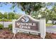 Community sign for Seminole Oaks with landscape at 9821 113Th St # 201, Seminole, FL 33772