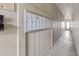 Hallway with mailboxes, doors and lights at 9821 113Th St # 201, Seminole, FL 33772