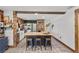 Open kitchen features butcher block island with seating and stainless steel appliances at 9821 113Th St # 201, Seminole, FL 33772