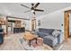 Comfortable living room has lots of seating, and opens to the kitchen at 9821 113Th St # 201, Seminole, FL 33772