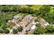Birds-eye view outlining the property's boundaries near a creek, showcasing neighborhood setting at 11009 Spivey Rd # 1, Gibsonton, FL 33534