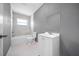 Renovated bathroom featuring a shower and tub, modern vanity and tile flooring at 11009 Spivey Rd # 1, Gibsonton, FL 33534