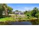 Freshly renovated single-story home nestled in a lush, private setting with waterfront views at 11009 Spivey Rd # 1, Gibsonton, FL 33534