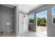 This renovated bonus room features tile floors, fresh paint and closet with mirrored doors at 11009 Spivey Rd # 1, Gibsonton, FL 33534