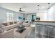 Bright living room boasting stylish decor and hardwood floors at 1221 E Hamilton Ave, Tampa, FL 33604
