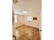 Bedroom with tile floors and two windows at 12907 N 53Rd St, Temple Terrace, FL 33617