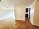 Bright and airy living room featuring neutral walls and stylish tile flooring at 12907 N 53Rd St, Temple Terrace, FL 33617