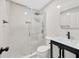 Renovated bathroom features a glass shower with modern fixtures at 1304 N Ferrell St, Plant City, FL 33563