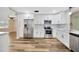Kitchen featuring stainless steel appliances and white cabinets at 1304 N Ferrell St, Plant City, FL 33563