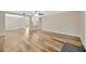 Spacious living room featuring hardwood floors and an open layout, perfect for entertaining at 1304 N Ferrell St, Plant City, FL 33563