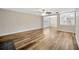 Spacious living room showcasing hardwood floors and lots of natural light at 1304 N Ferrell St, Plant City, FL 33563