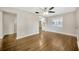This living room features hardwood floors and access to an updated kitchen at 1304 N Ferrell St, Plant City, FL 33563