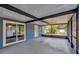 Enclosed patio with access to both the interior of the house and the backyard at 1304 N Ferrell St, Plant City, FL 33563