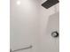 Close-up of a modern shower with sleek fixtures and a convenient grab bar at 1304 N Ferrell St, Plant City, FL 33563