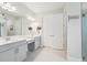 This bathroom features double sinks, ample vanity space, and a separate water closet at 13098 Wellspring Dr, Lithia, FL 33547