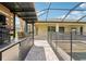 Outdoor kitchen complete with grill, countertop space, and mini fridge, perfect for backyard entertaining at 13098 Wellspring Dr, Lithia, FL 33547