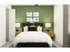 Cozy bedroom features a comfortable bed, bedside tables, and themed artwork at 13123 Empress Jewel Trl, Parrish, FL 34219