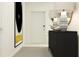 Stylish entryway featuring console table, lamps, and modern artwork for a welcoming ambiance at 13123 Empress Jewel Trl, Parrish, FL 34219