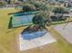 Aerial view of community tennis courts, basketball, and sand volleyball court at 13201 Wellington Hills Dr, Riverview, FL 33579