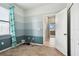 Bedroom featuring three-tone color block paint design and a window with decorative curtains at 13201 Wellington Hills Dr, Riverview, FL 33579