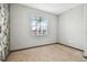 Bright bedroom with a window offering natural light and simple, clean design at 13201 Wellington Hills Dr, Riverview, FL 33579