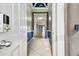 View of entry and hallway features custom ceilings and stone accents at 13201 Wellington Hills Dr, Riverview, FL 33579
