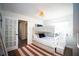 This bedroom features bunkbeds and a door with glass panels for natural light at 1394 Stonehenge Way, Palm Harbor, FL 34683