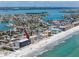 Stunning overhead capture of condo community with beach access, close to town and beautiful water views at 14300 Gulf Blvd # 401, Madeira Beach, FL 33708