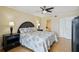 Cozy bedroom featuring a comfortable bed and ample closet space at 14300 Gulf Blvd # 401, Madeira Beach, FL 33708