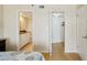 View showcasing an ensuite bathroom and closet off of the primary bedroom at 14300 Gulf Blvd # 401, Madeira Beach, FL 33708