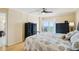 Bright bedroom with balcony access, offering stunning ocean views at 14300 Gulf Blvd # 401, Madeira Beach, FL 33708