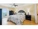 Comfortable bedroom with balcony access offering ocean views at 14300 Gulf Blvd # 401, Madeira Beach, FL 33708