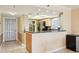 Well-lit kitchen featuring modern appliances and ample counter space at 14300 Gulf Blvd # 401, Madeira Beach, FL 33708