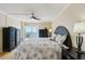 Inviting main bedroom with balcony and plenty of natural light at 14300 Gulf Blvd # 401, Madeira Beach, FL 33708