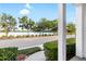 Scenic water views from the property's front, showcasing lush landscaping and tranquil surroundings at 14648 Bournemouth Rd, Tampa, FL 33626
