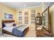 Comfortable bedroom with playful decor and a cozy bed, creating a welcoming atmosphere at 14910 Tom Fazio Ct, Tampa, FL 33626