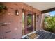Inviting front entry with brick exterior and decorative door at 18712 Lakeshore Dr, Lutz, FL 33549