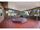 Relaxing screened-in patio with a hot tub, perfect for outdoor enjoyment at 18712 Lakeshore Dr, Lutz, FL 33549