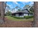 Exterior view of home with well-maintained landscaping at 200 Pinewinds Blvd, Oldsmar, FL 34677