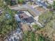 Overhead view of the property highlighting the home's layout, outdoor spaces, and nearby streets at 202 W Azalea Ave, Tampa, FL 33612