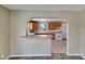 Efficient kitchen featuring a breakfast bar, classic cabinetry, and modern appliances at 2402 Harper St, Tampa, FL 33605