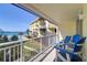 Balcony view showcasing the ocean, pool, and building, offering serene outdoor living and a coastal lifestyle at 2504 Gulf Blvd # 201, Indian Rocks Beach, FL 33785