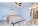 Inviting bedroom with wood-look flooring and serene decor at 2524 Laurelwood Ln, Valrico, FL 33596
