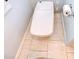 Modern toilet in a tiled bathroom at 2524 Laurelwood Ln, Valrico, FL 33596