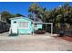 Backyard patio with outdoor dining table and grill, perfect for entertaining at 3031 56Th S St, Gulfport, FL 33707