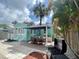 Backyard features a patio with outdoor dining and BBQ area, perfect for gatherings at 3031 56Th S St, Gulfport, FL 33707