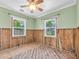 This bedroom is undergoing renovations and features two windows for natural light at 3031 56Th S St, Gulfport, FL 33707